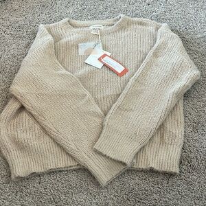 Thread and supply neutral sweater